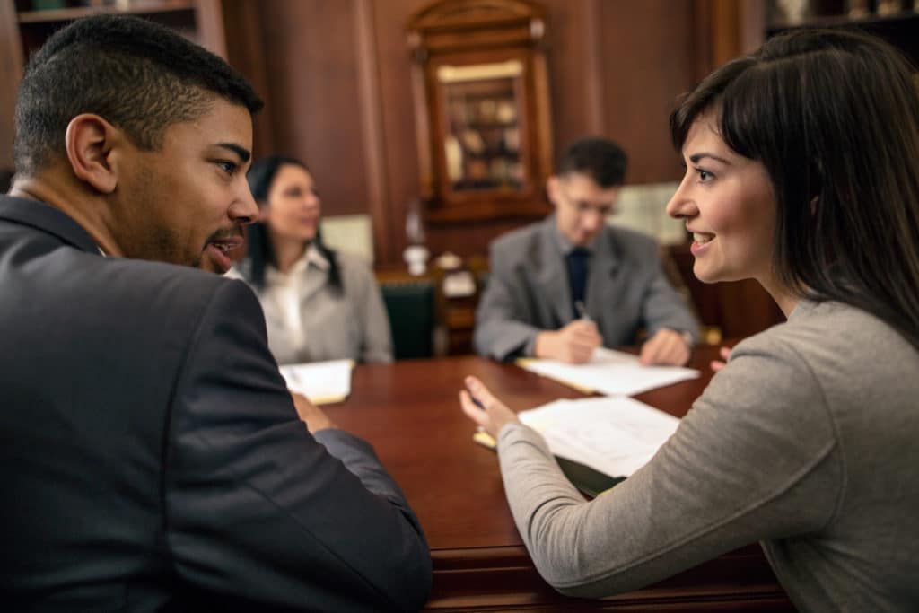 group of young business people or lawyers – meeting in an office